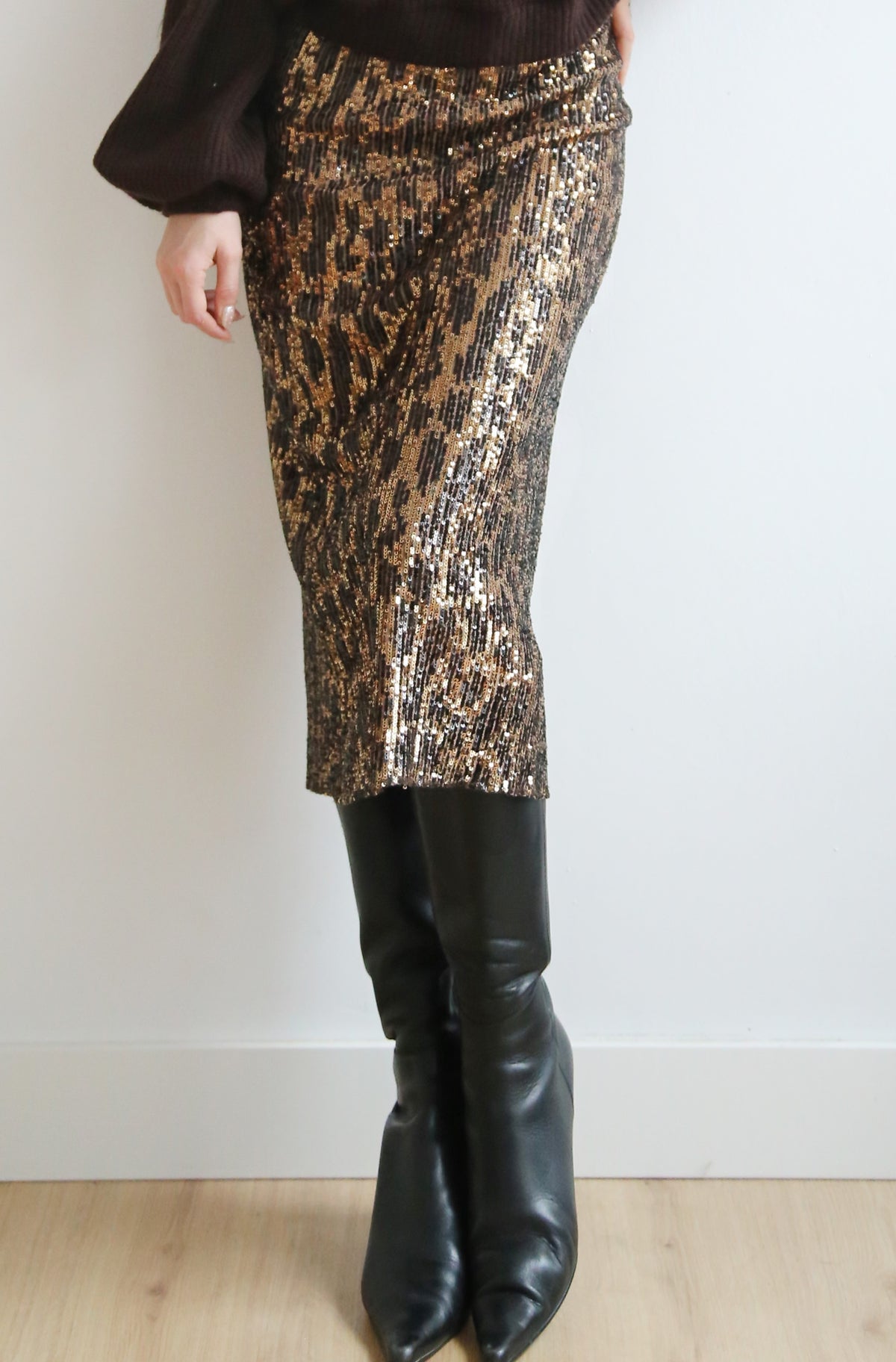 Falda lentejuelas, print leopardo, cintura elástica.