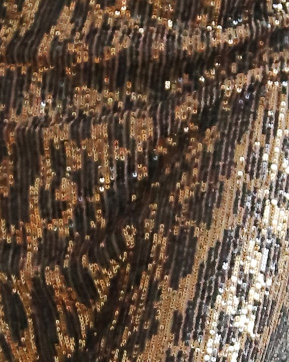 Falda lentejuelas, print leopardo, cintura elástica.