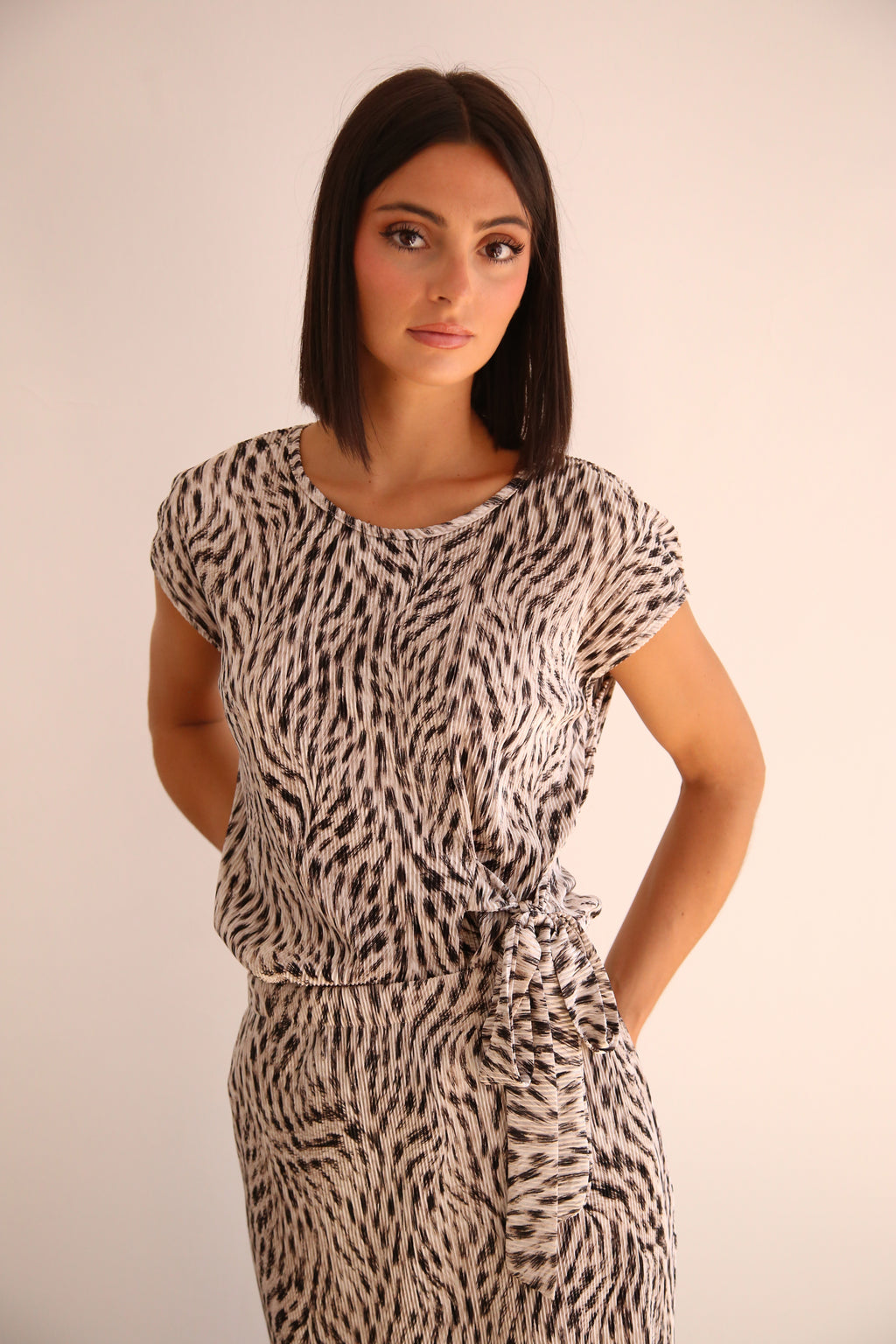 Blusa plisada con lazada