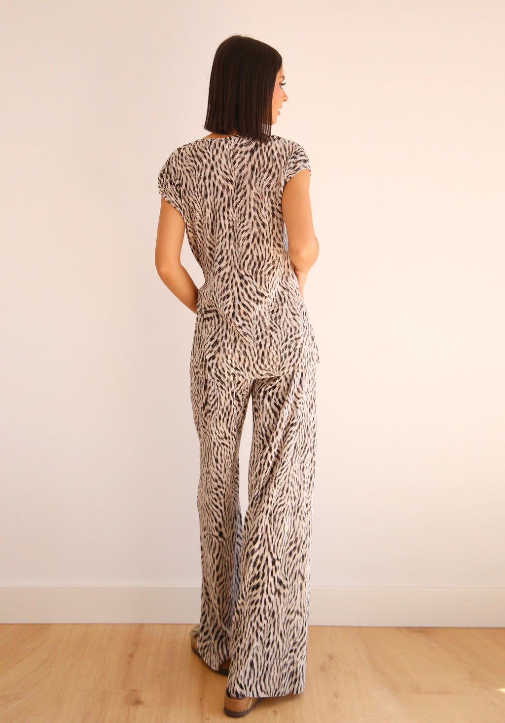 Pantalón ancho plisado con goma rebel